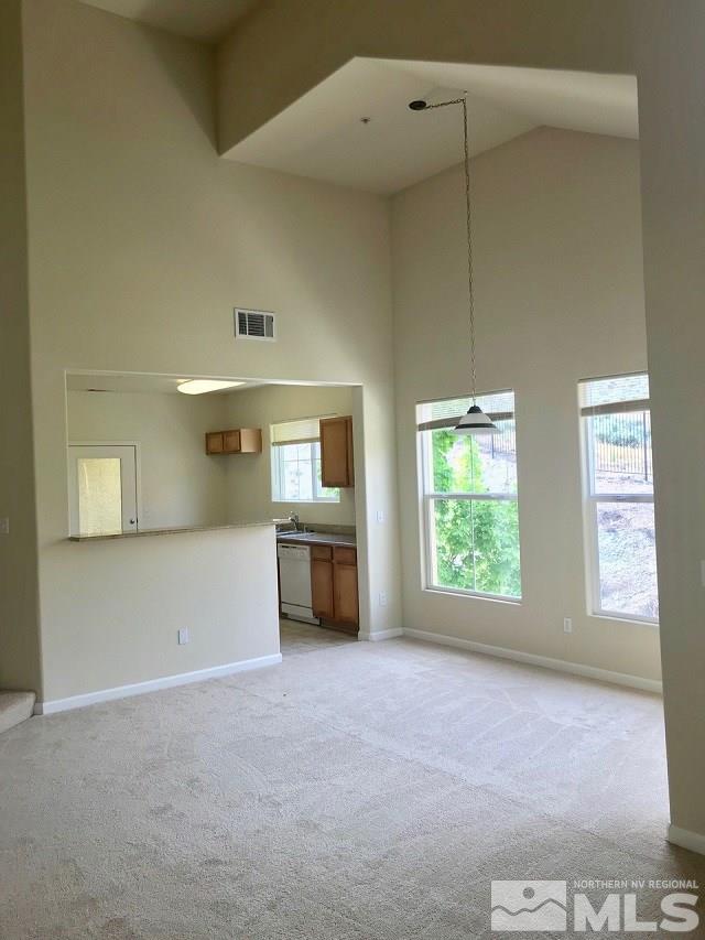 9050 Double R Boulevard, Unit 1125 Reno, NV 89511 - Photo 5 of 24 a view of an empty room with a window
