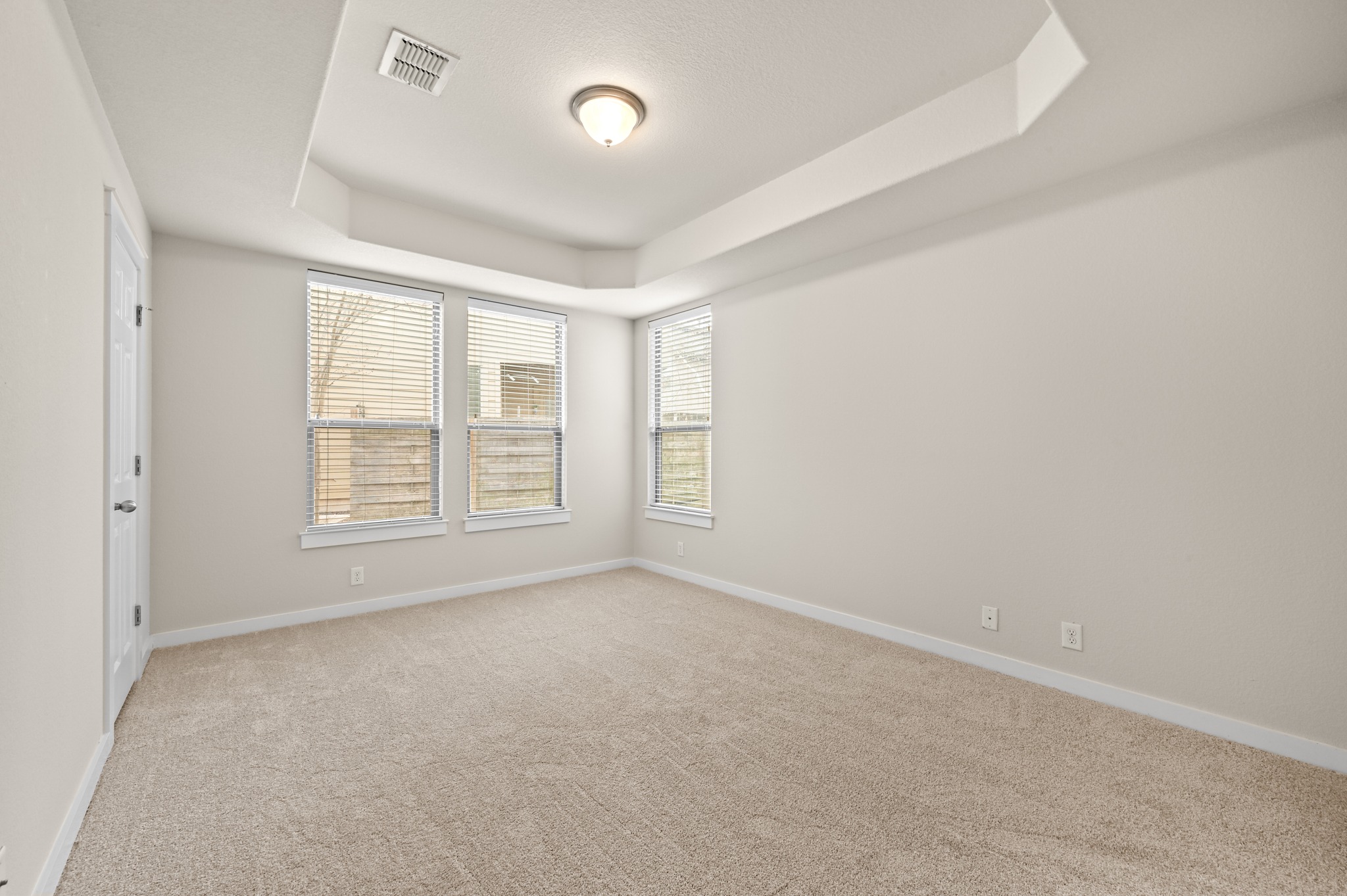 2101 Rivers Edge Way, Unit 32 Austin, TX 78741 - Photo 9 of 24 Empty Primary Bedroom with connected bath, ready for you to make it yours!