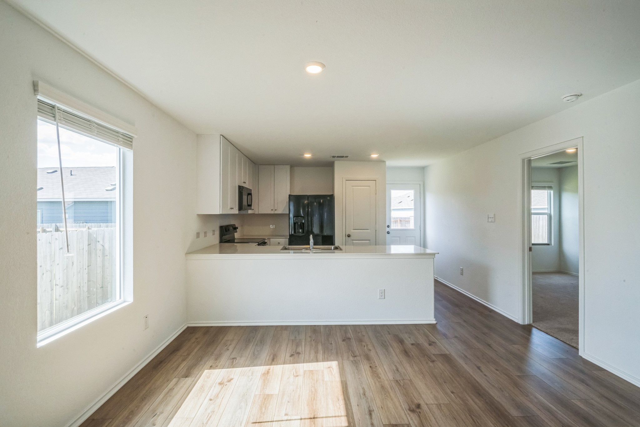 505 Sergeant Murphy Road Jarrell, TX 76537 - Photo 16 of 16 a view of kitchen with wooden floor and window