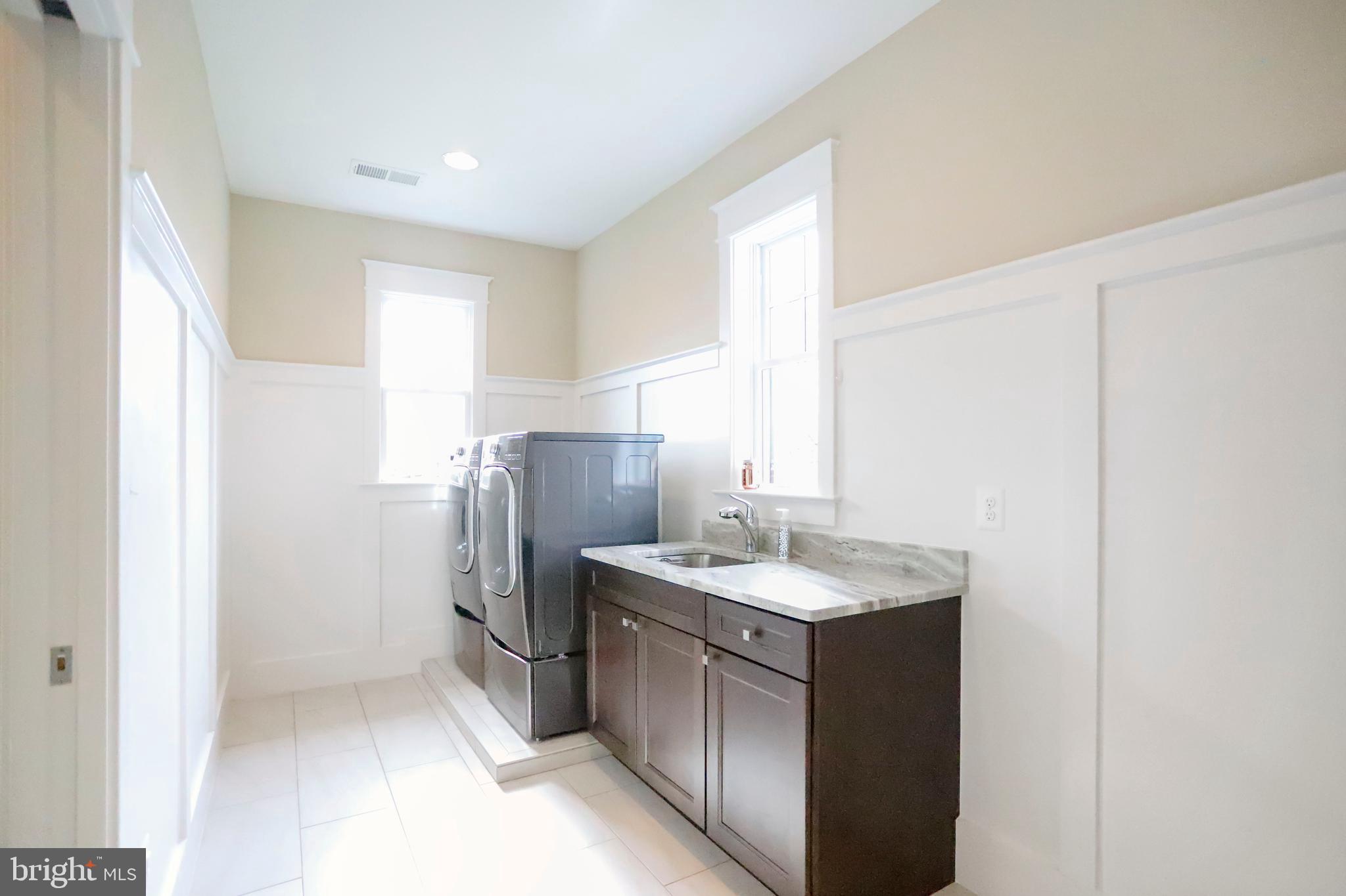 6719 Van Fleet Drive McLean, VA 22101 - Photo 25 of 37 Spacious Laundry Room with two windows