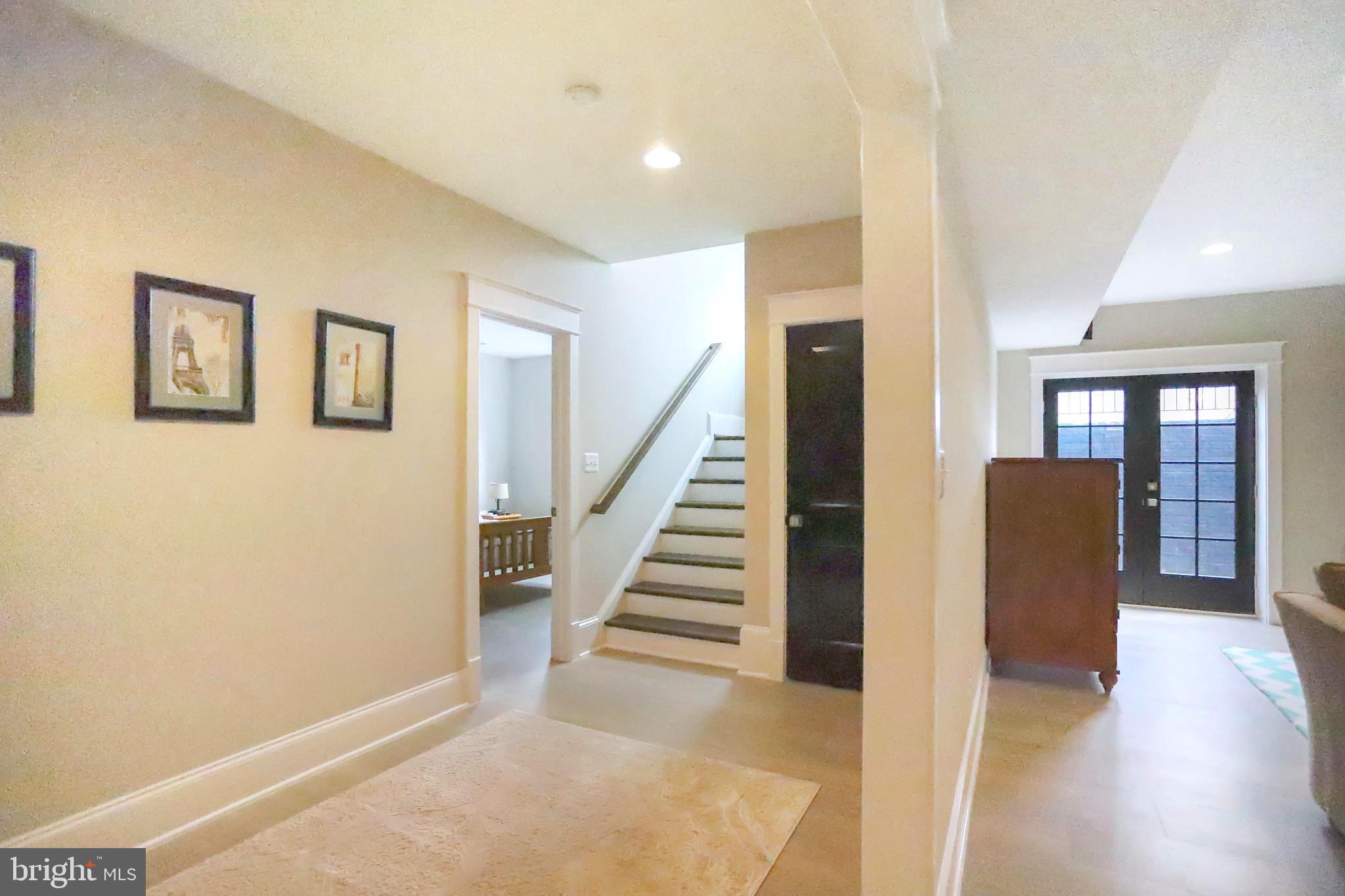 6719 Van Fleet Drive McLean, VA 22101 - Photo 31 of 37 LL showing door to AuPair Suite and Walkup Stairs