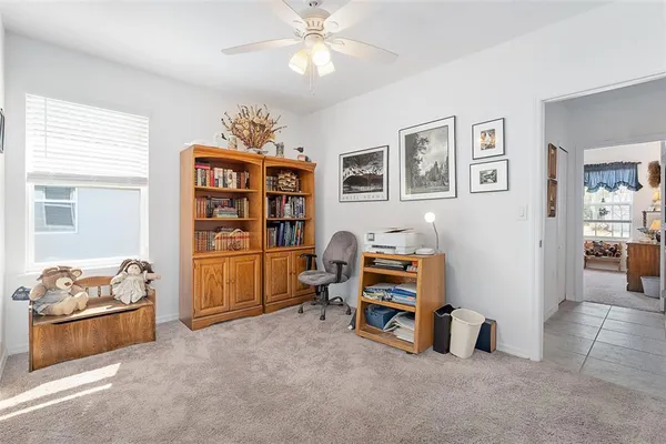 a workspace with a bookshelf