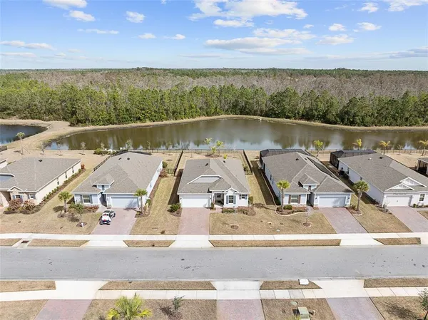 a view of a yard in front of the house