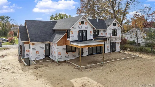 front view of a house with a street