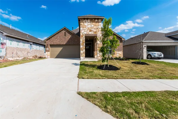 a view of a house with entertaining space