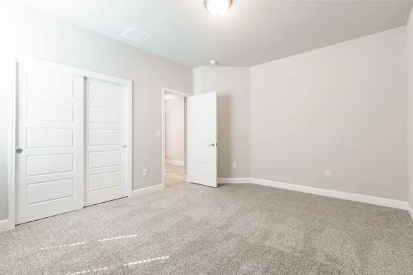 an empty room with closet