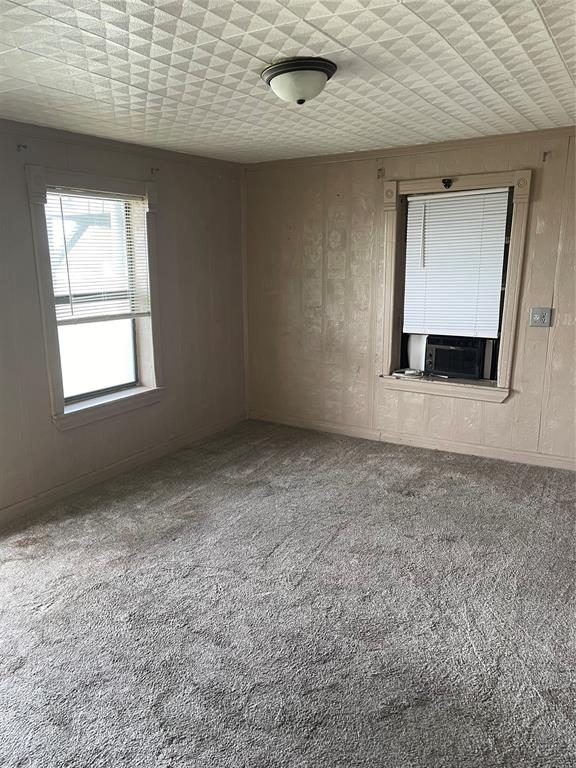 241 Aurora Street Rhome, TX 76078 - Photo 18 of 28 featuring carpet and cooling unit