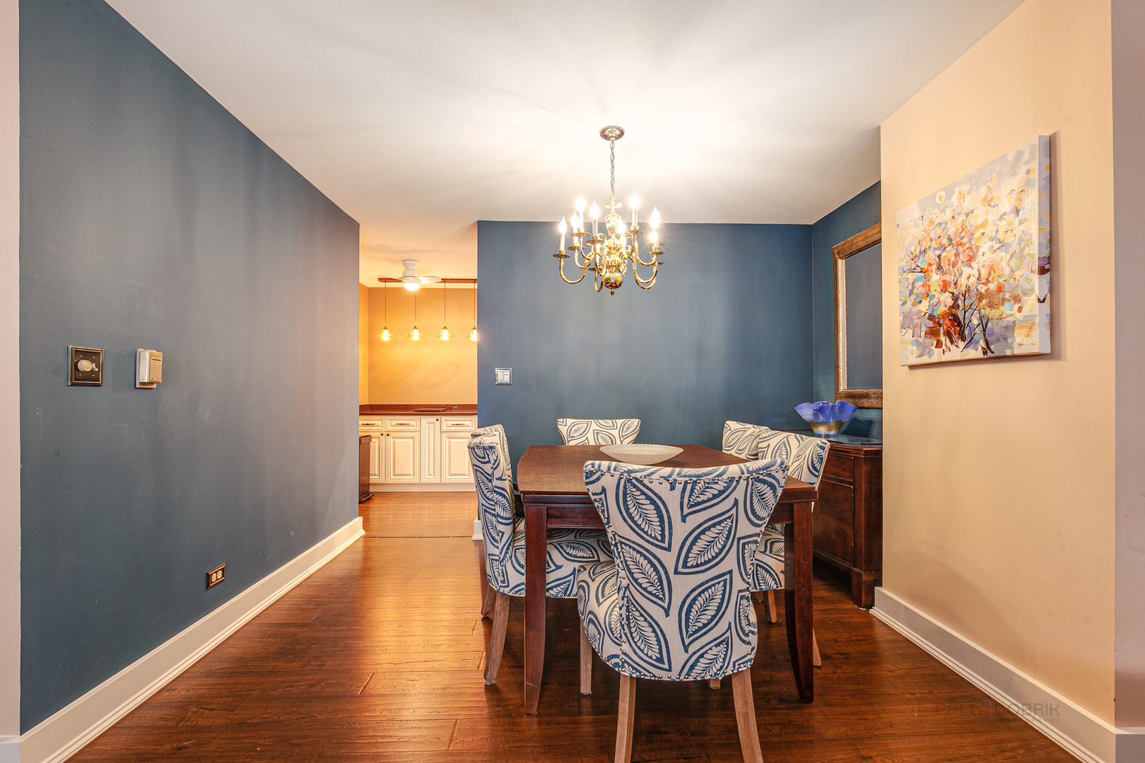 2300 Windsor Mall, Unit 2E Park Ridge, IL 60068 - Photo 11 of 23 a view of a dining room with furniture wooden floor and chandelier