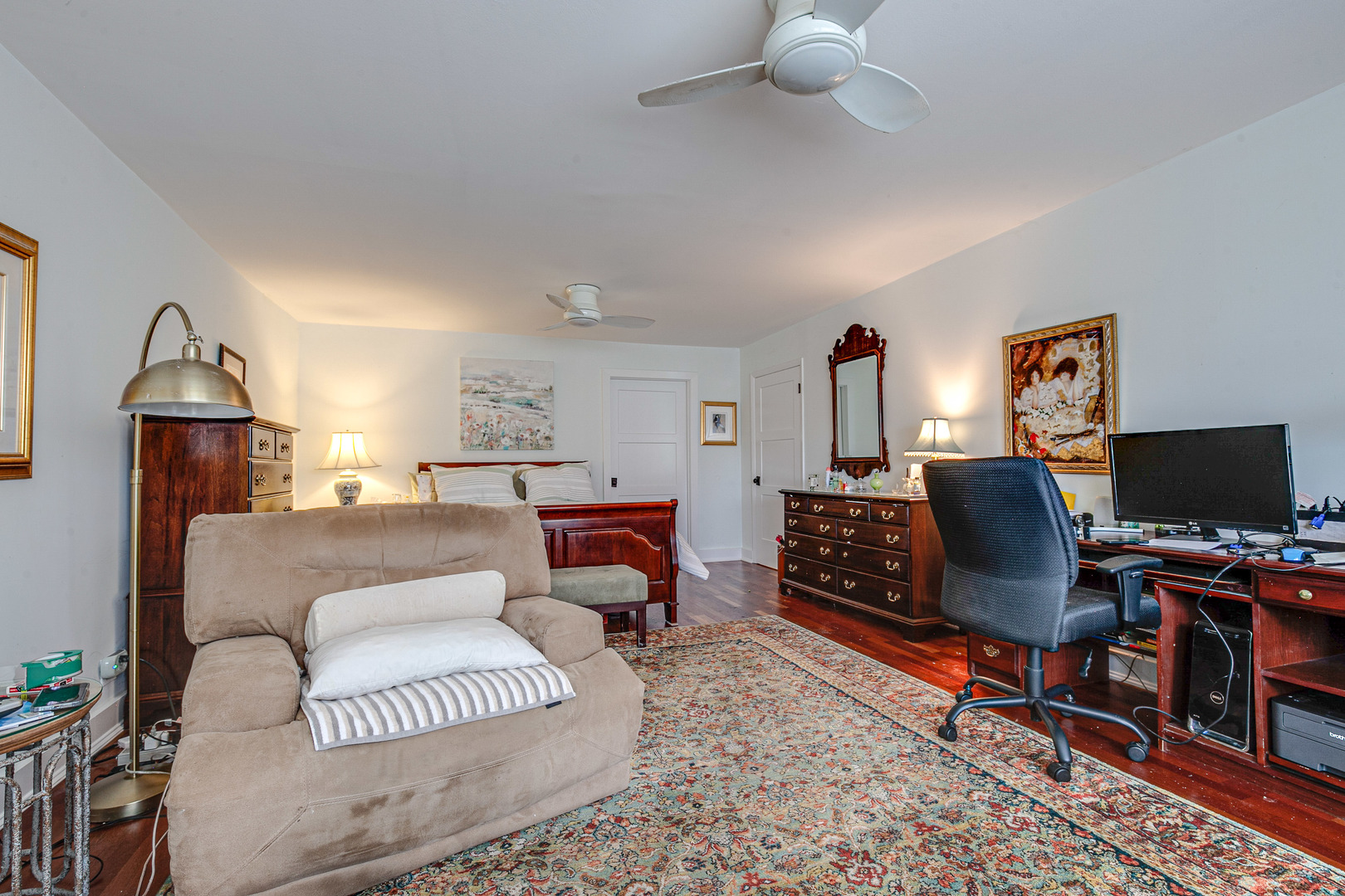 2300 Windsor Mall, Unit 2E Park Ridge, IL 60068 - Photo 22 of 23 a living room with furniture a piano and a flat screen tv