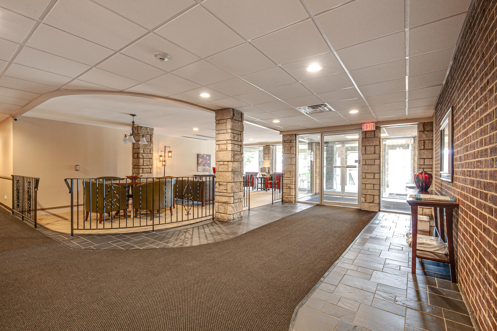 2300 Windsor Mall, Unit 2E Park Ridge, IL 60068 - Photo 3 of 23 a lobby with furniture and floor to ceiling window