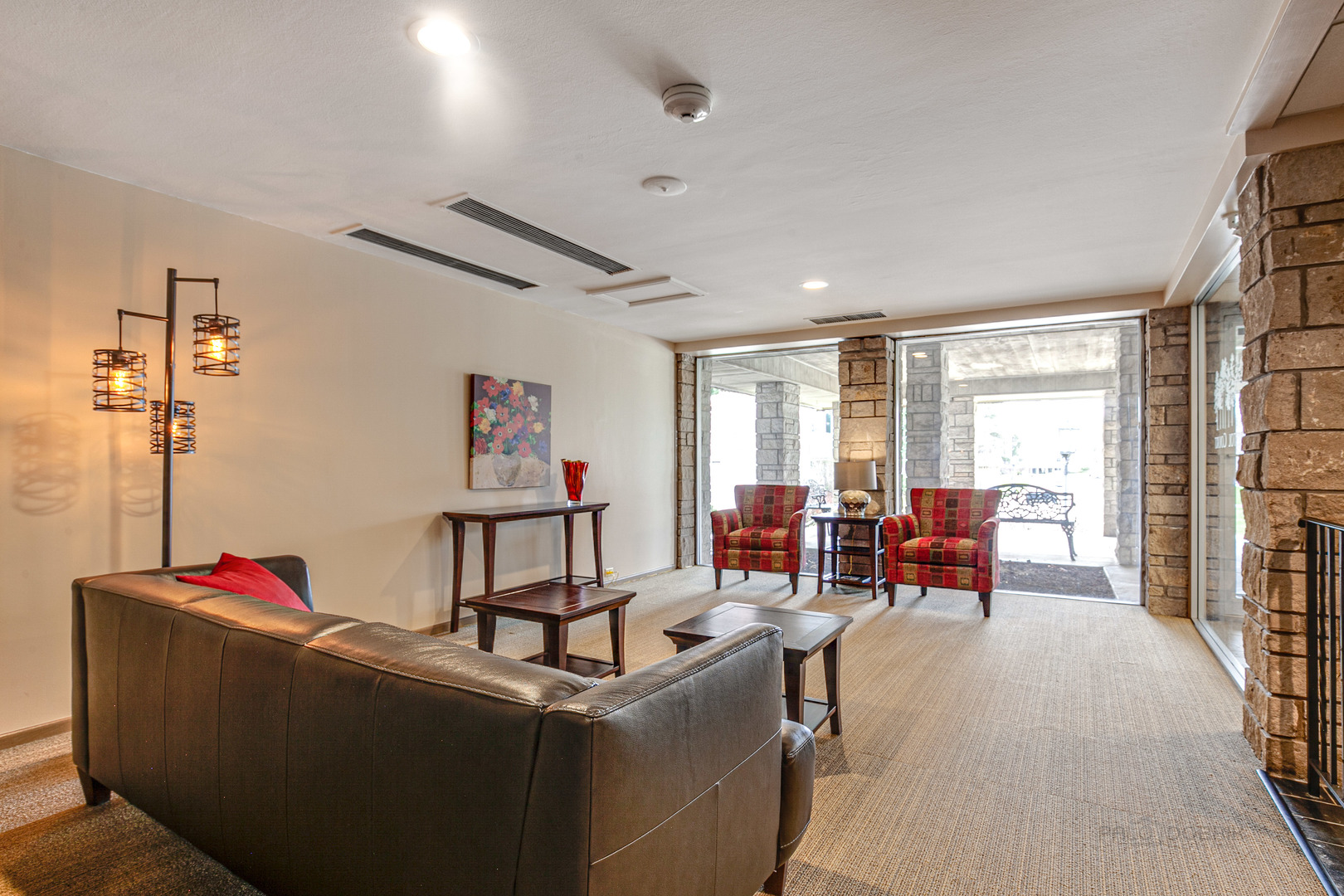 2300 Windsor Mall, Unit 2E Park Ridge, IL 60068 - Photo 4 of 23 a living room with furniture and a flat screen tv