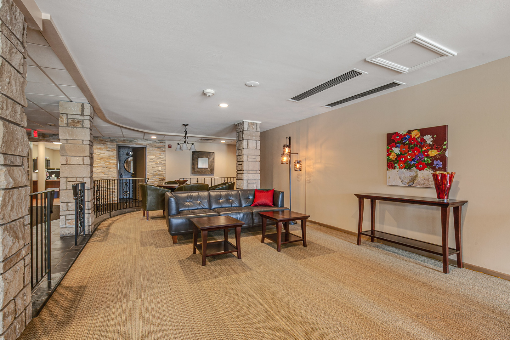 2300 Windsor Mall, Unit 2E Park Ridge, IL 60068 - Photo 5 of 23 a living room with furniture and a wooden floor