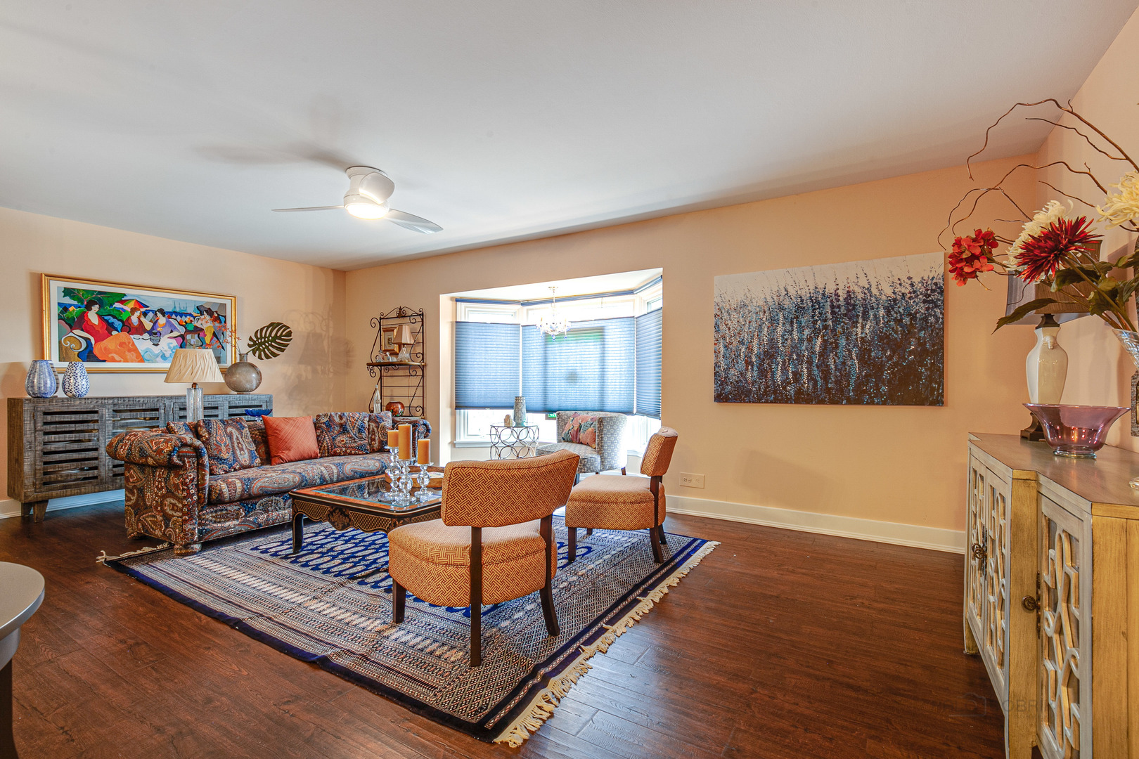 2300 Windsor Mall, Unit 2E Park Ridge, IL 60068 - Photo 8 of 23 a living room with furniture a lamp and a potted plant