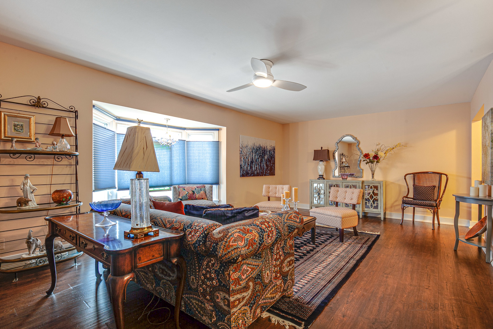 2300 Windsor Mall, Unit 2E Park Ridge, IL 60068 - Photo 10 of 23 a living room with furniture and a wooden floor