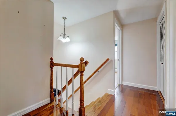 a view of entryway with wooden floor