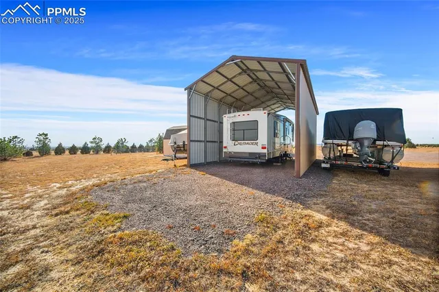 a view of a terrace with furniture