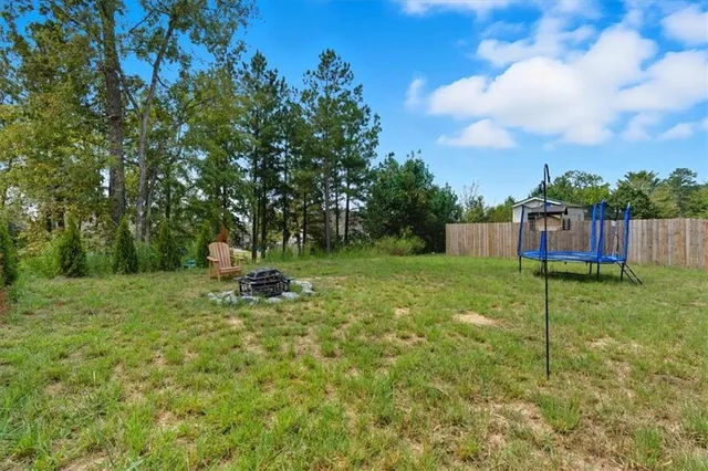 a view of a garden with a slide