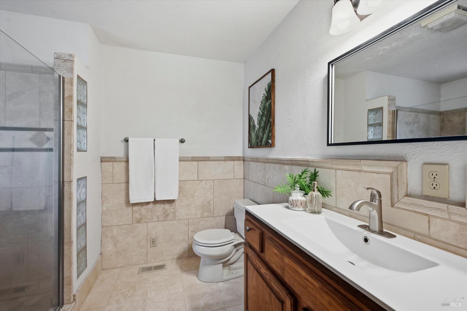 929 Helen Avenue Ukiah, CA 95482 - Photo 12 of 36 a bathroom with a sink toilet and shower