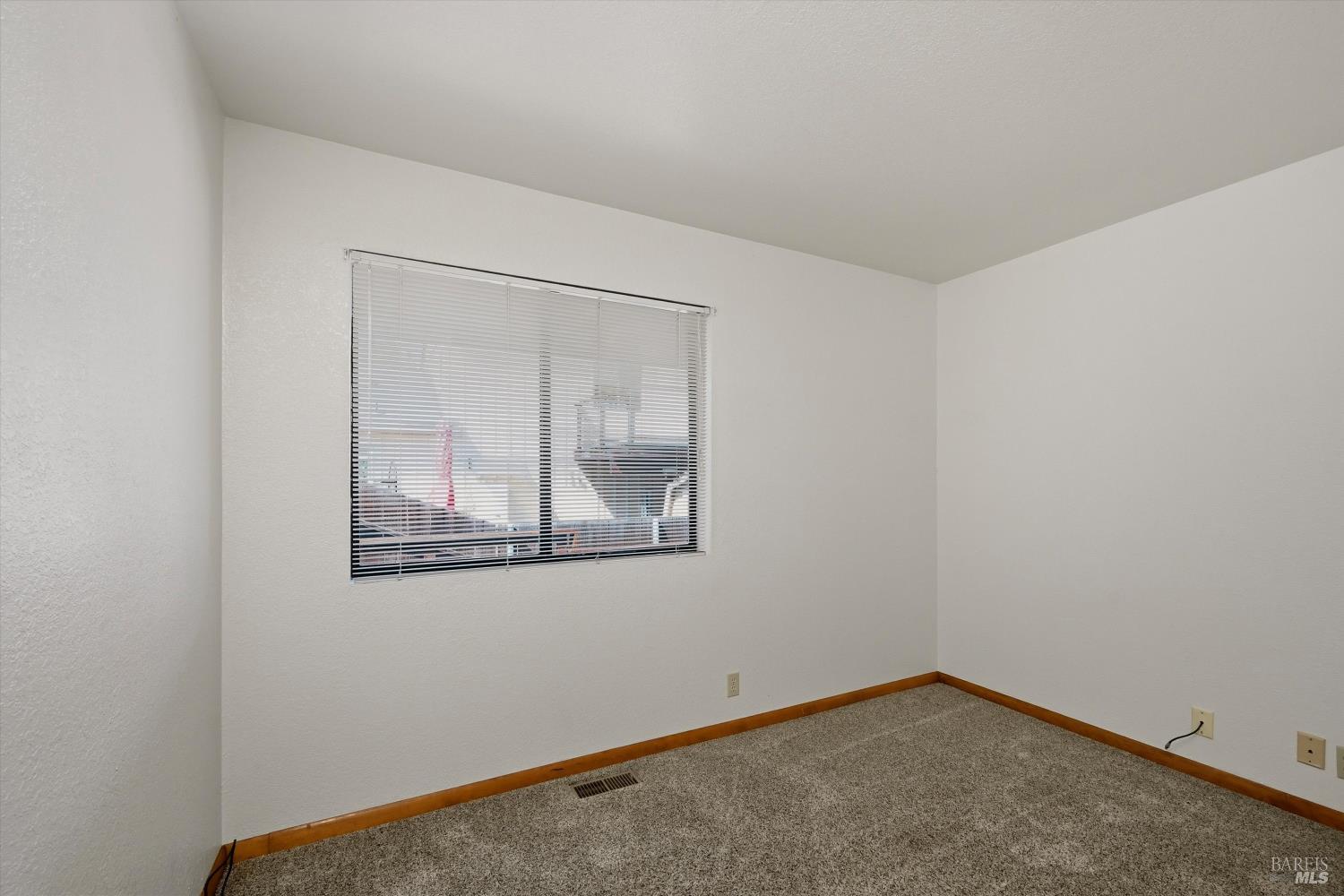 929 Helen Avenue Ukiah, CA 95482 - Photo 15 of 36 an empty room with a window