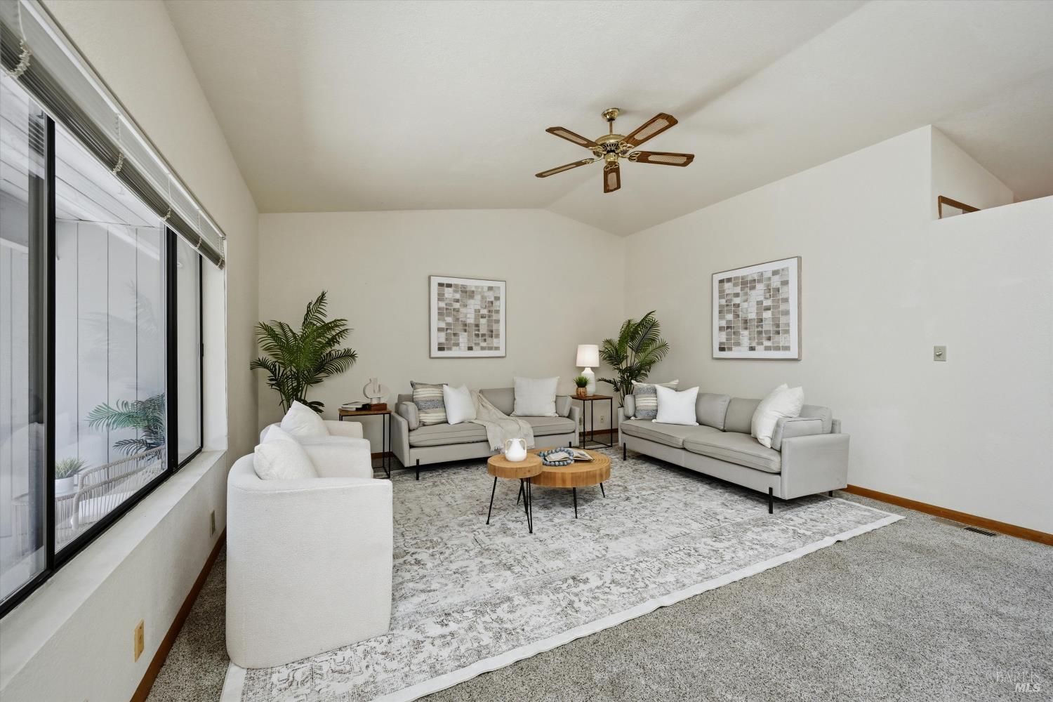 929 Helen Avenue Ukiah, CA 95482 - Photo 2 of 36 a living room with furniture and a large window
