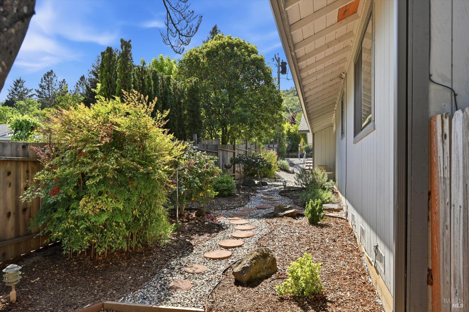 929 Helen Avenue Ukiah, CA 95482 - Photo 24 of 36 a view of a backyard with plants