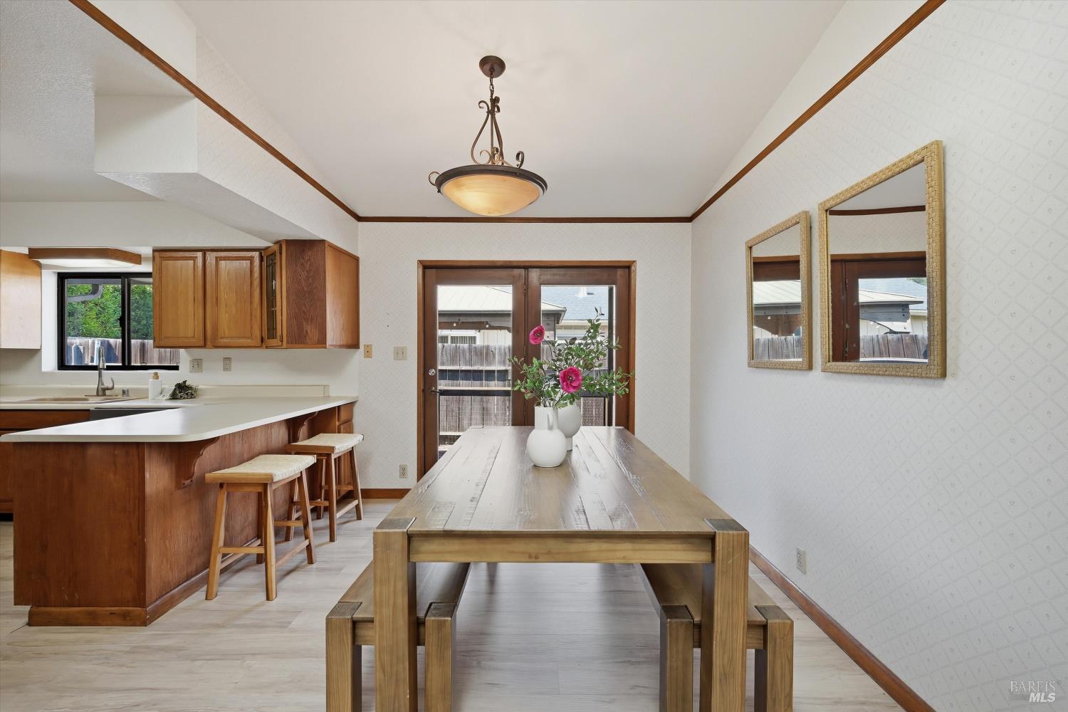 929 Helen Avenue Ukiah, CA 95482 - Photo 4 of 36 a view of a dining room with furniture window and wooden floor