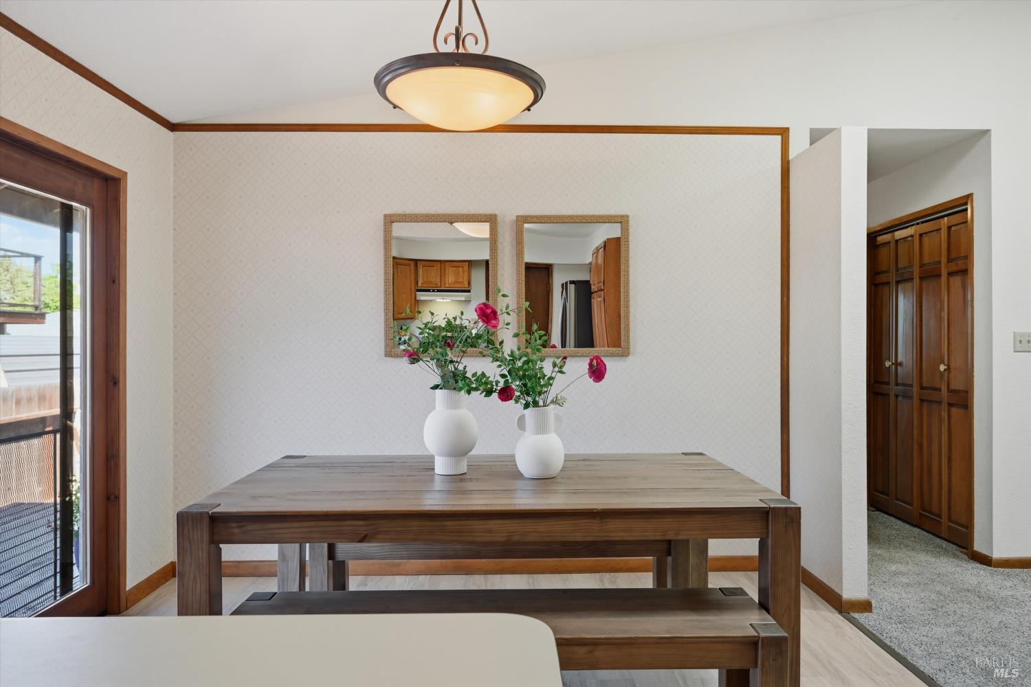 929 Helen Avenue Ukiah, CA 95482 - Photo 5 of 36 a dining room with table chairs and wooden floor