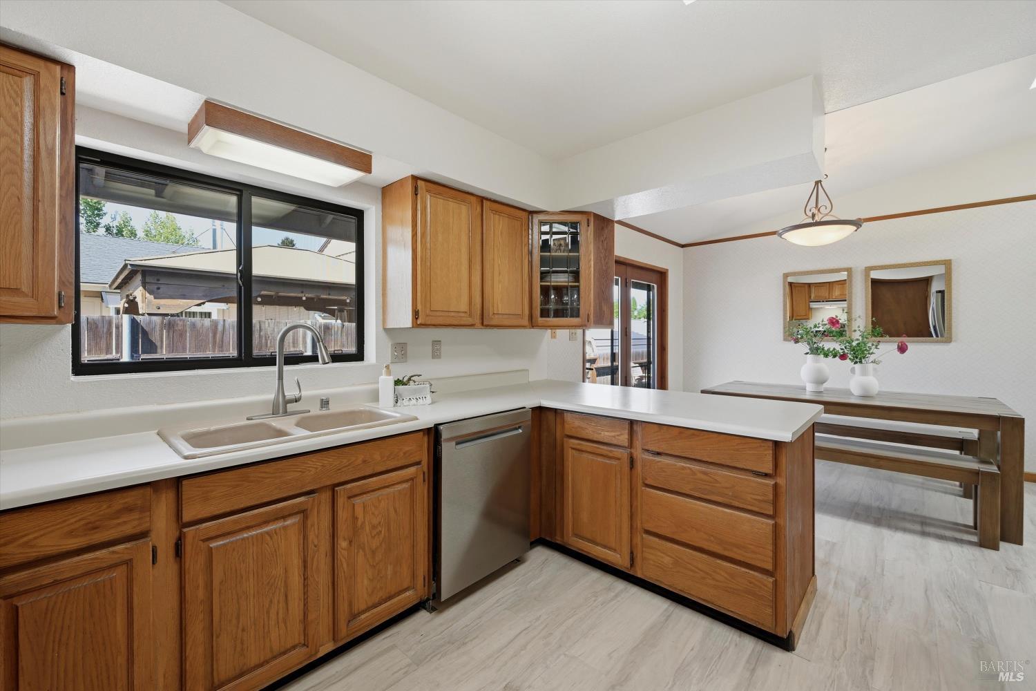 929 Helen Avenue Ukiah, CA 95482 - Photo 7 of 36 a kitchen with sink and window