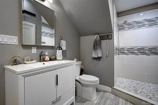a utility room with sink dryer and washer