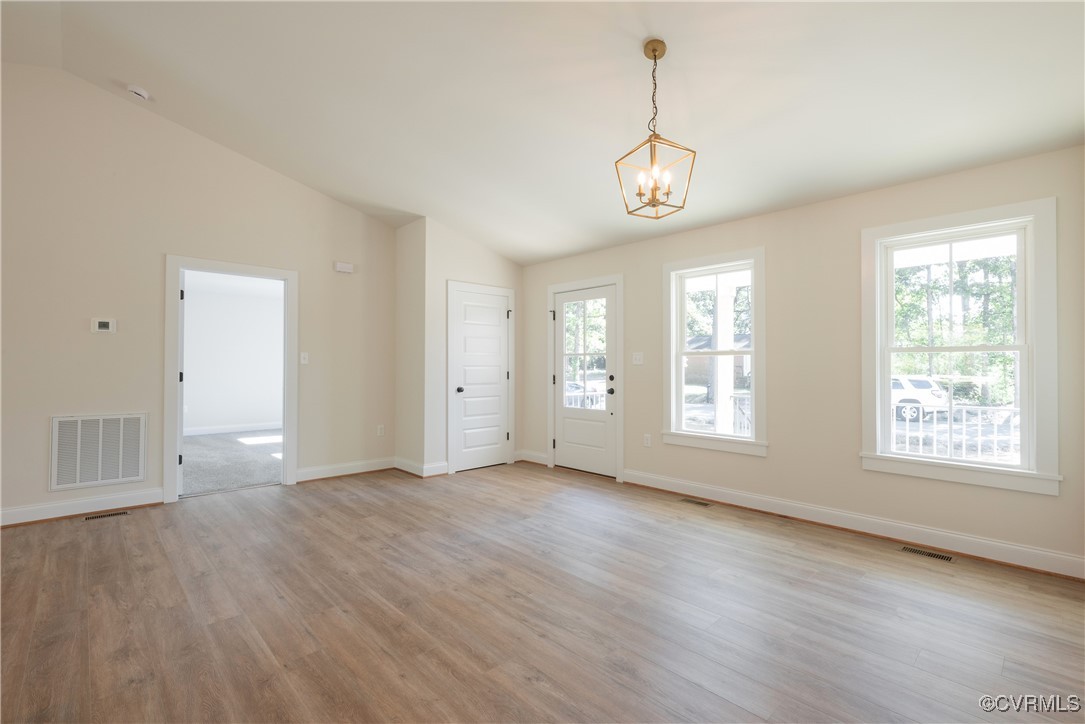 3020 Botone Avenue Richmond, VA 23237 - Photo 11 of 33 a view of an empty room with wooden floor and a window