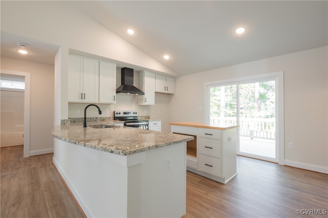 3020 Botone Avenue Richmond, VA 23237 - Photo 13 of 33 a kitchen with a sink cabinets and wooden floor