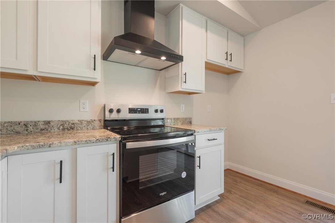 3020 Botone Avenue Richmond, VA 23237 - Photo 17 of 33 a kitchen with stainless steel appliances granite countertop white cabinets and a stove
