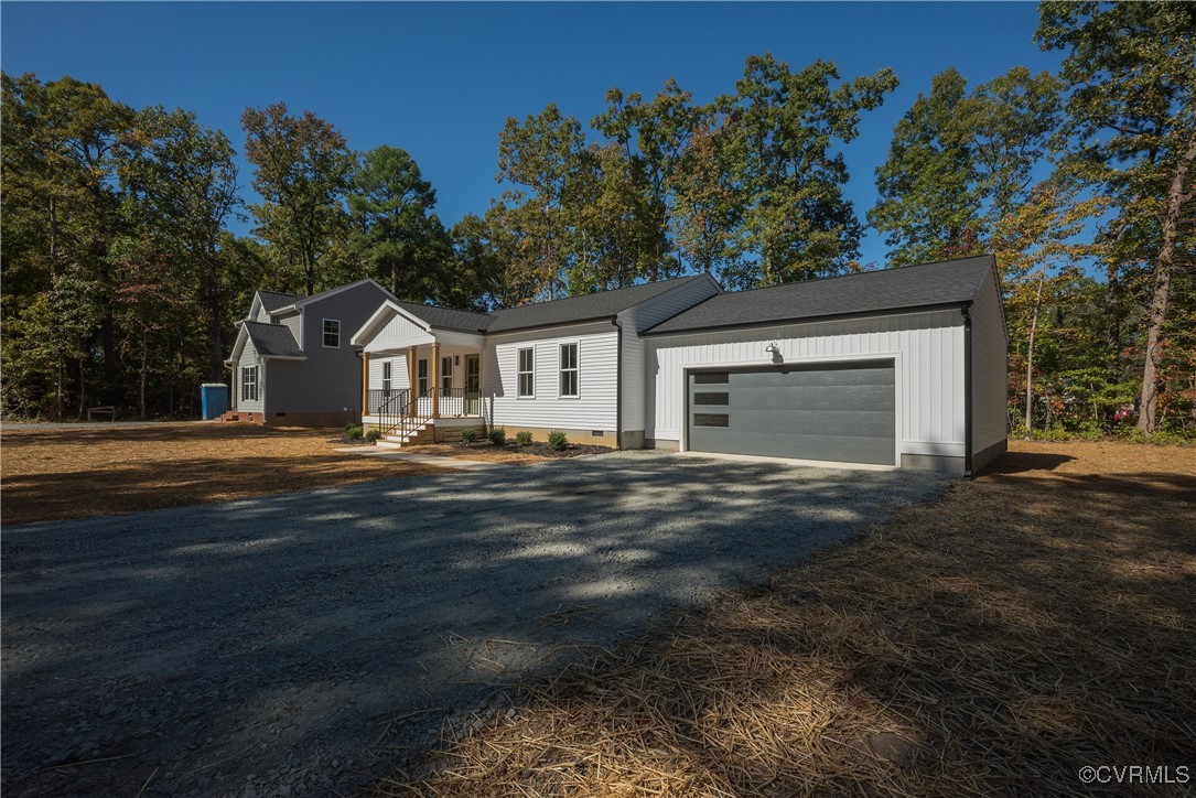 3020 Botone Avenue Richmond, VA 23237 - Photo 2 of 33 a front view of house with yard and trees in the background