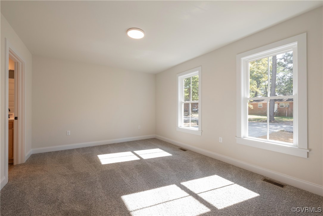 3020 Botone Avenue Richmond, VA 23237 - Photo 21 of 33 an empty room with windows