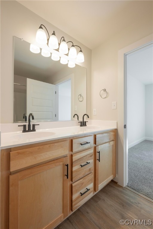 3020 Botone Avenue Richmond, VA 23237 - Photo 27 of 33 a bathroom with a double vanity sink and a mirror