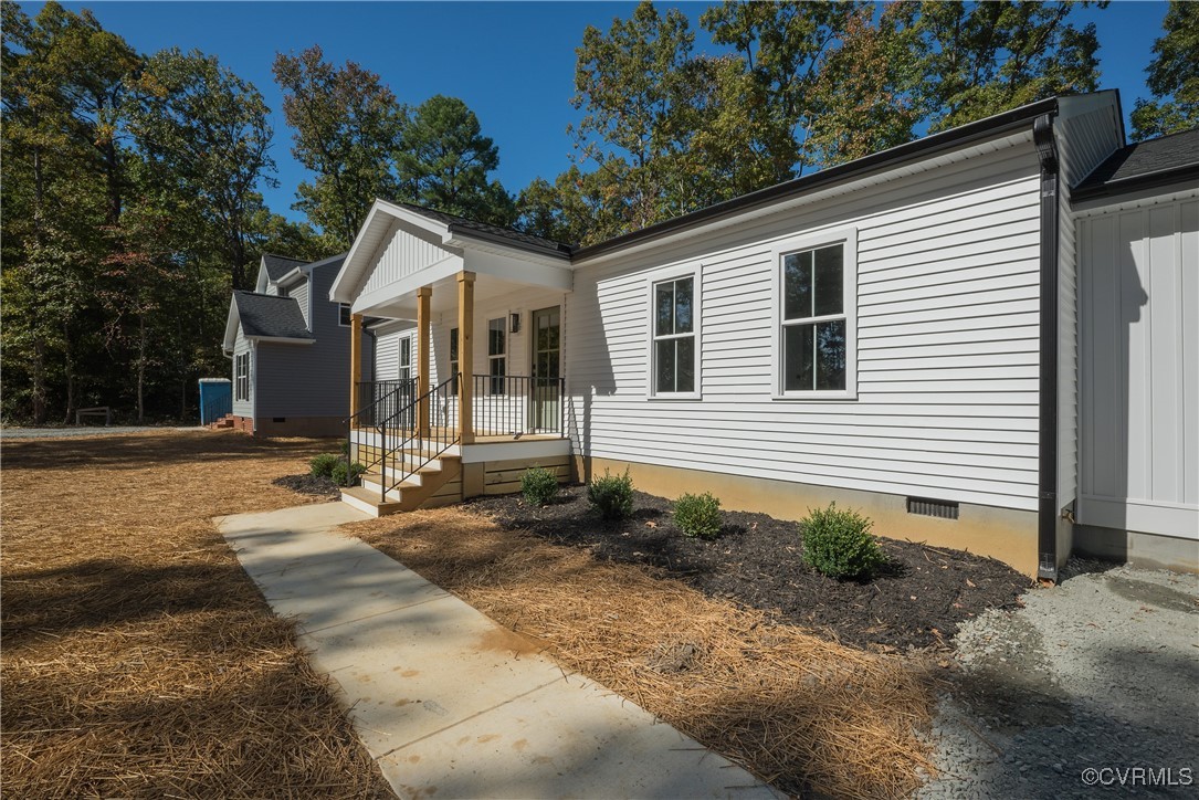 3020 Botone Avenue Richmond, VA 23237 - Photo 3 of 33 a front view of a house with garden