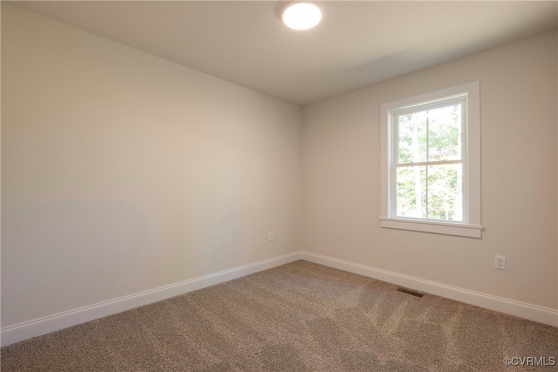3020 Botone Avenue Richmond, VA 23237 - Photo 32 of 33 an empty room with a window