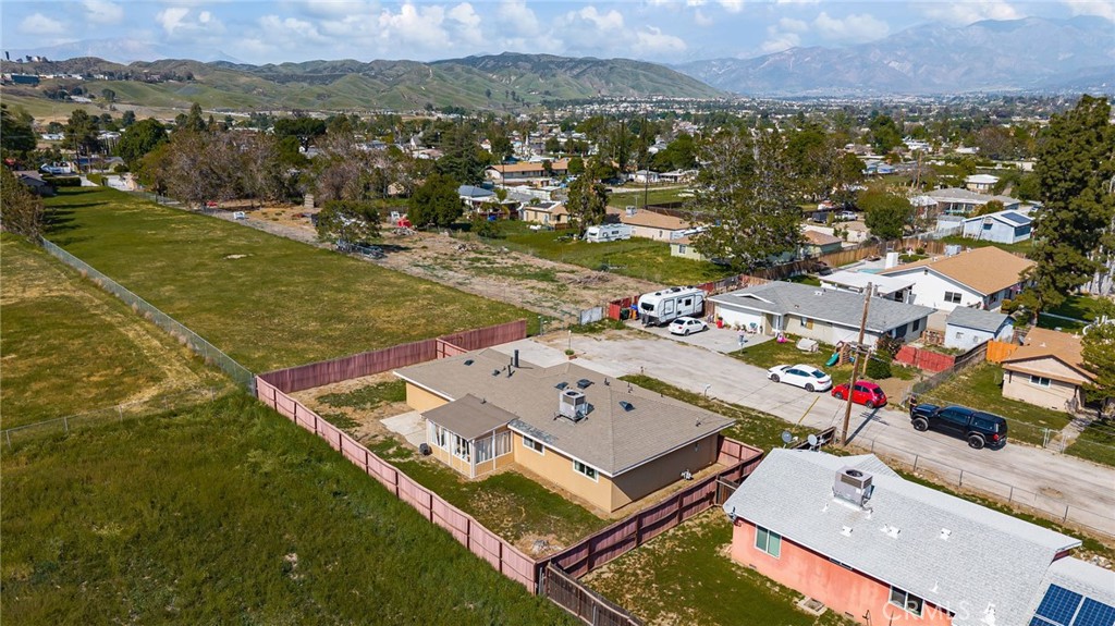 12610 Serrano Drive Yucaipa, CA 92399 - Photo 28 of 29 an aerial view of residential houses with outdoor space