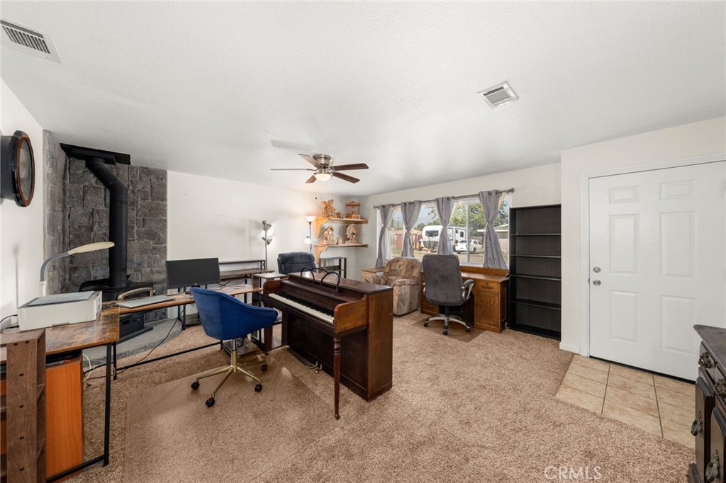 12610 Serrano Drive Yucaipa, CA 92399 - Photo 3 of 29 a view of a workspace with furniture