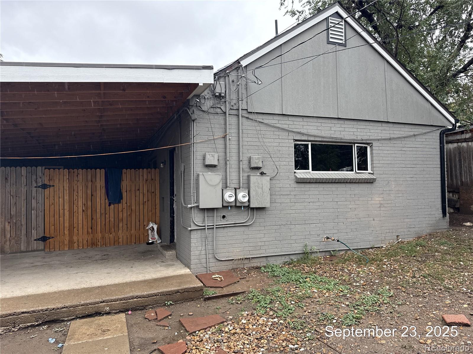 237 South Julian Street Denver, CO 80219 - Photo 12 of 13 a view of a house with wooden fence