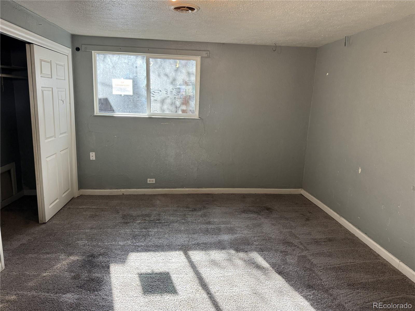 237 South Julian Street Denver, CO 80219 - Photo 5 of 13 a view of a small space with a window