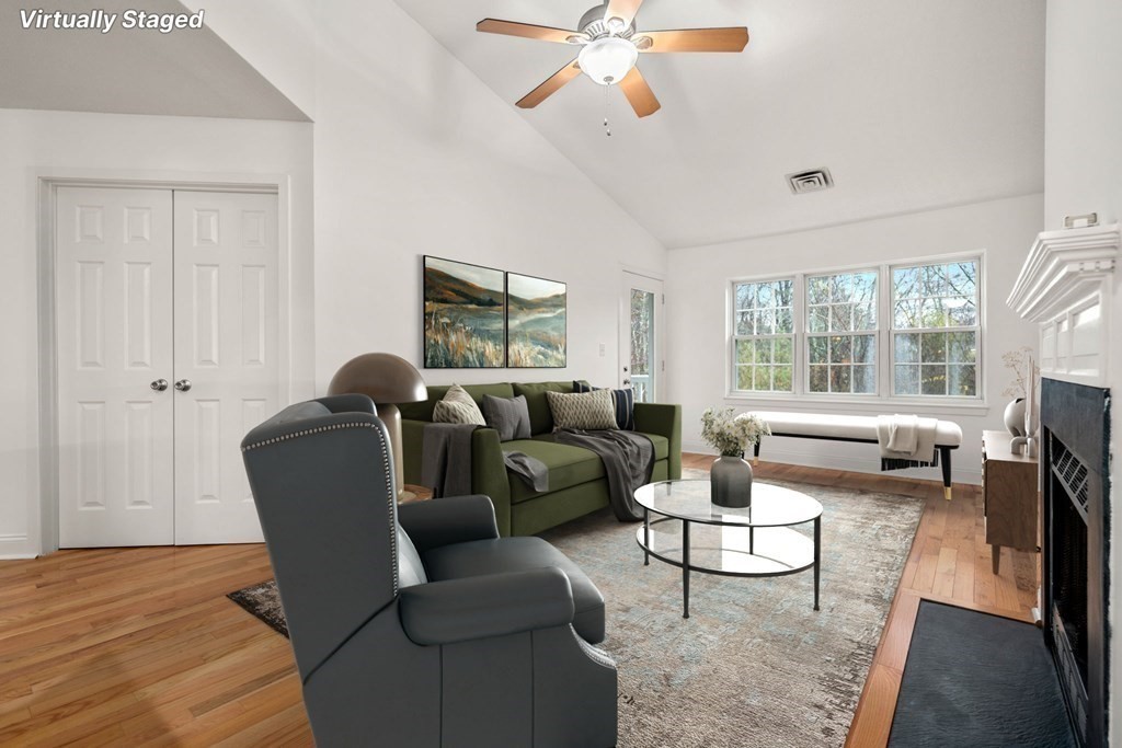 100 Brookside Drive, Unit F Andover, MA 01810 - Photo 1 of 22 a living room with furniture and a fireplace