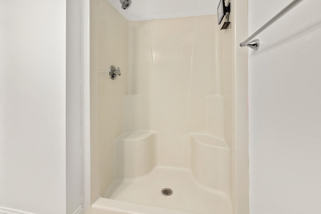 100 Brookside Drive, Unit F Andover, MA 01810 - Photo 20 of 22 a bathroom with a shower