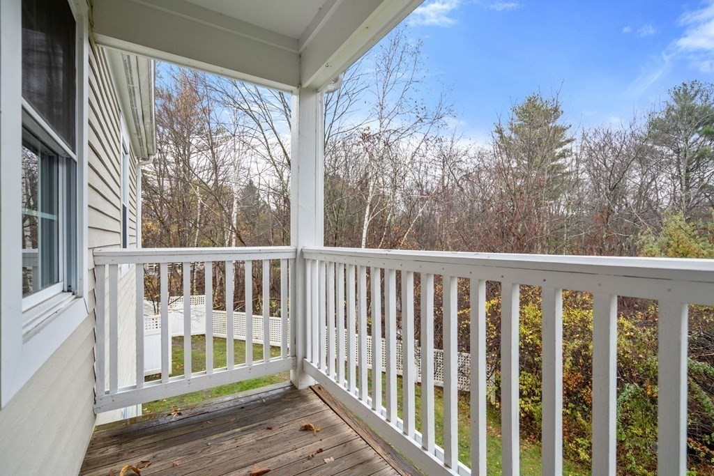 100 Brookside Drive, Unit F Andover, MA 01810 - Photo 2 of 22 a view of wooden balcony
