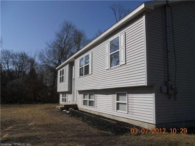 3 Jolley Road Plainfield, CT 06239 - Photo 1 of 1 a view of a house with a yard