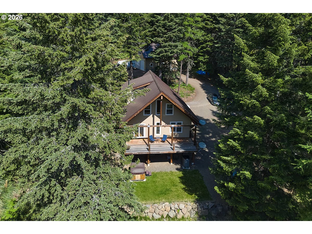 64368 Tamarack Road Lostine, OR 97857 - Photo 1 of 39 a front view of a house with a yard