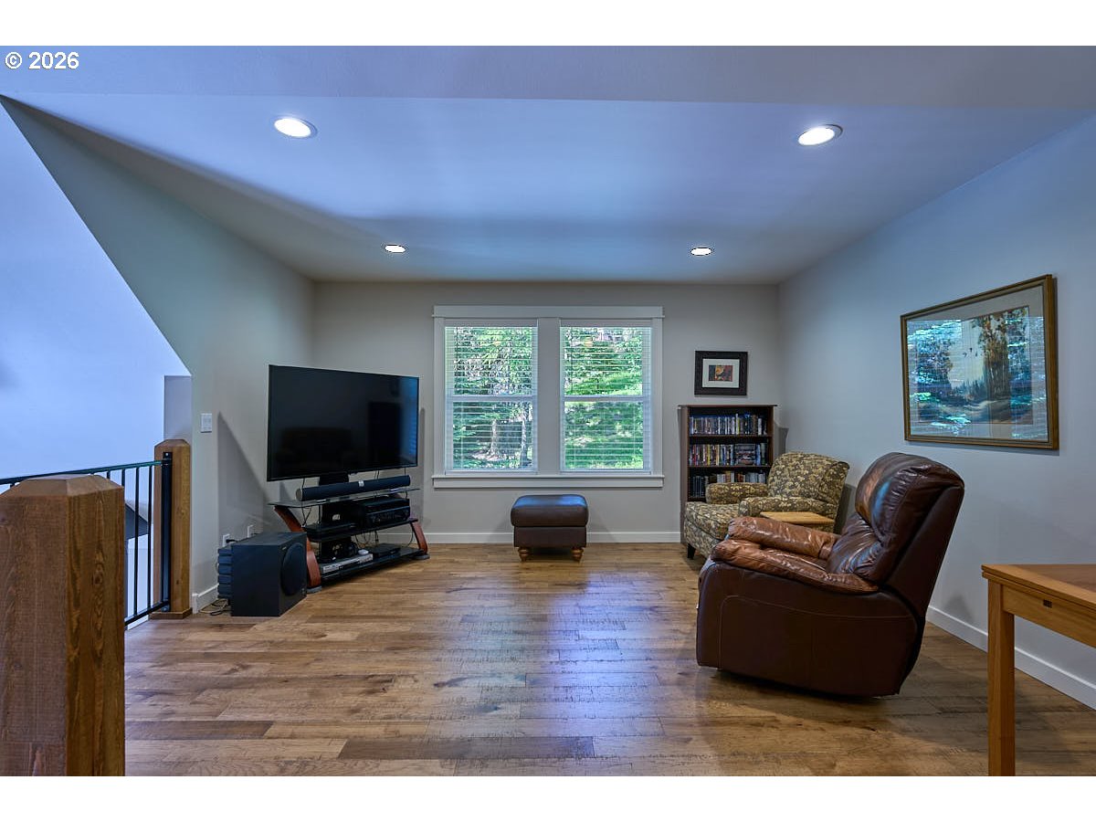 64368 Tamarack Road Lostine, OR 97857 - Photo 23 of 39 a living room with furniture and a flat screen tv