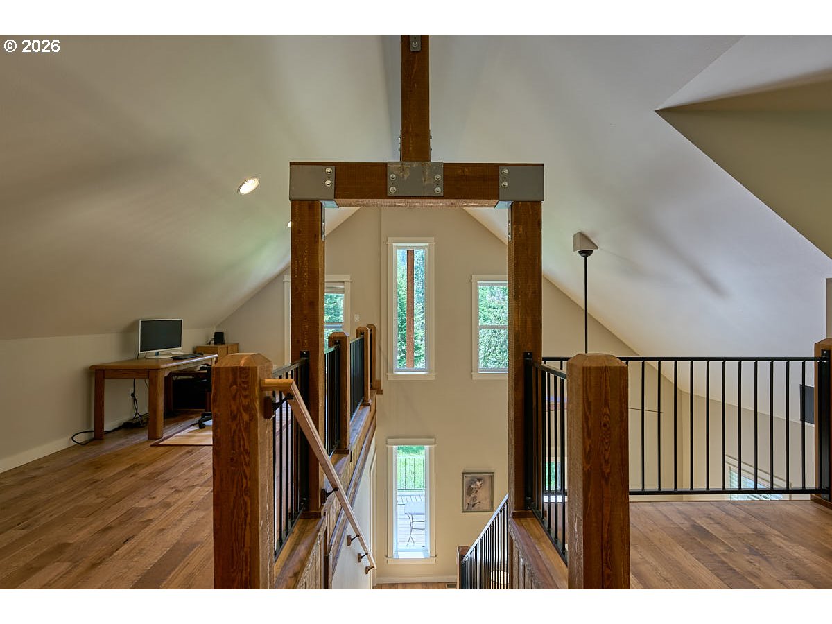 64368 Tamarack Road Lostine, OR 97857 - Photo 27 of 39 a view of a hallway with wooden floor