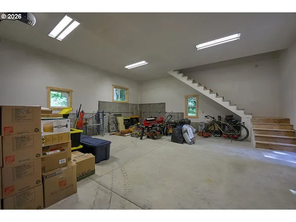 a living room with furniture and a tv