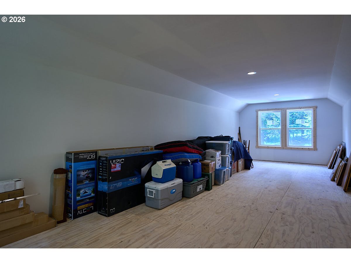 64368 Tamarack Road Lostine, OR 97857 - Photo 32 of 39 a living room with furniture and a tv